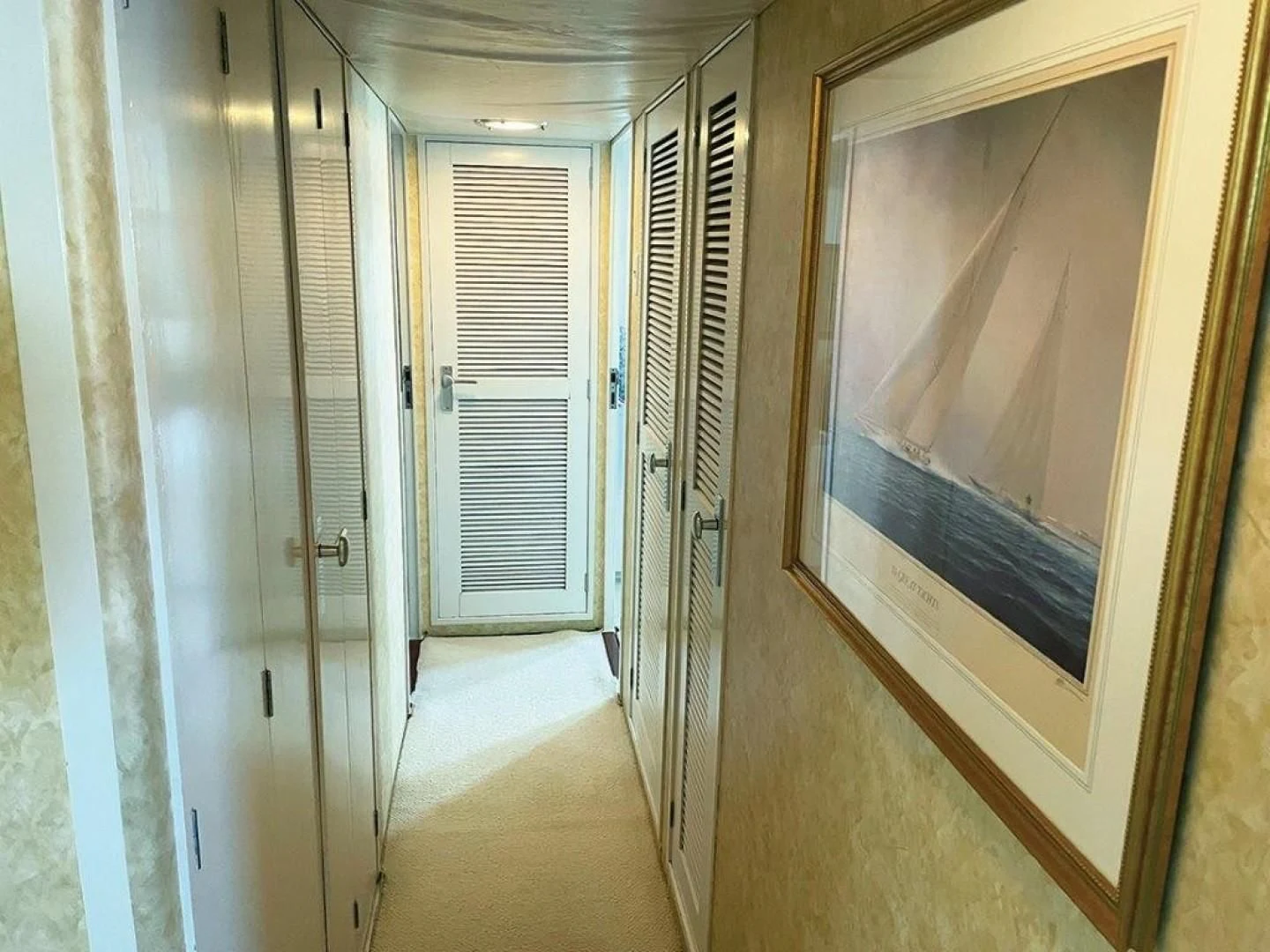 a hallway with doors aboard SEA CZAR Yacht for Sale