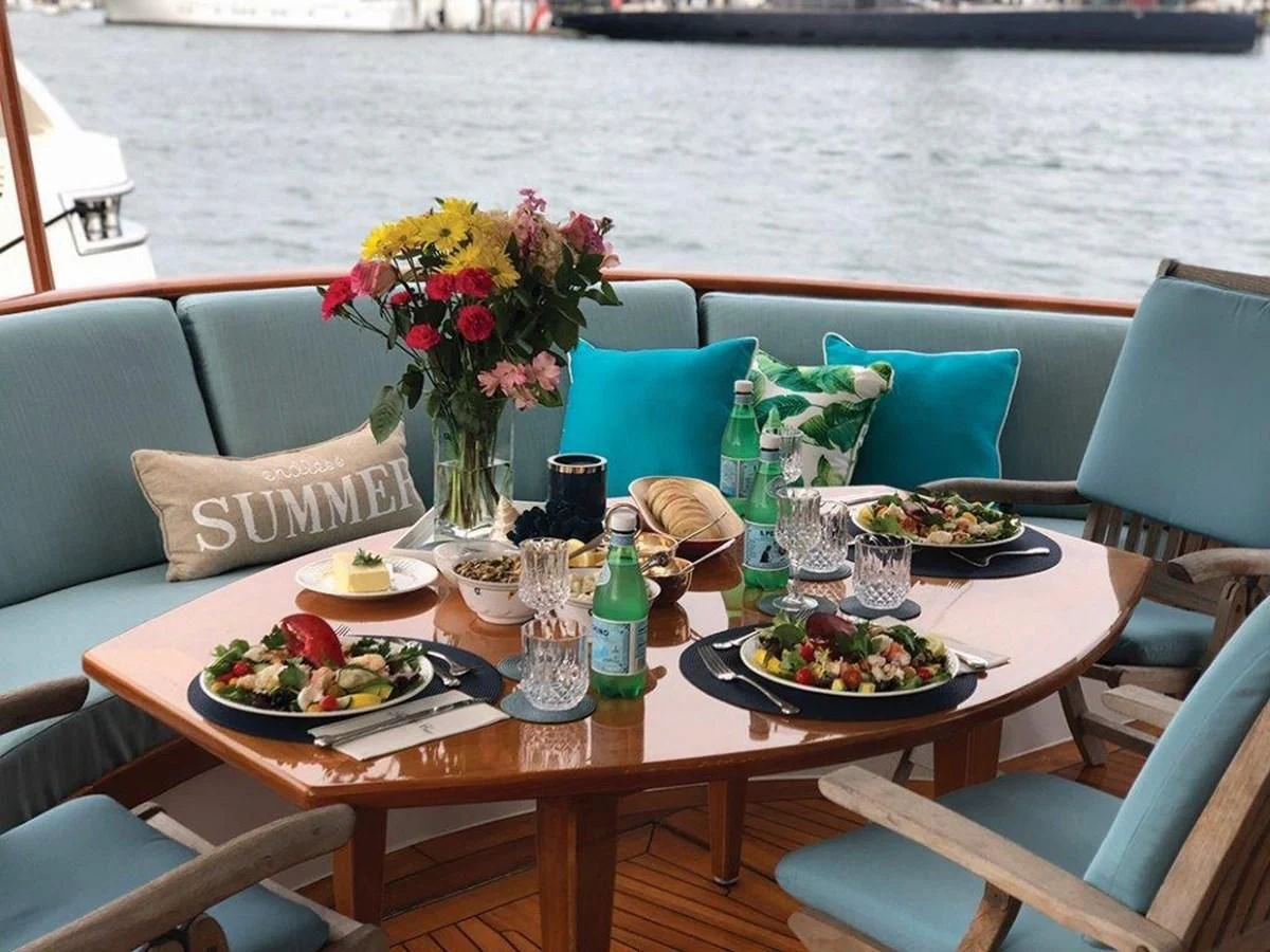 a table with food on it aboard SEA CZAR Yacht for Sale