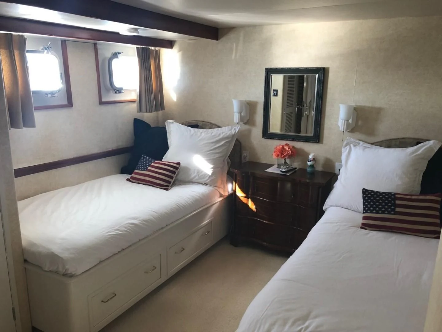 a couple of beds in a hotel room aboard SEA CZAR Yacht for Sale
