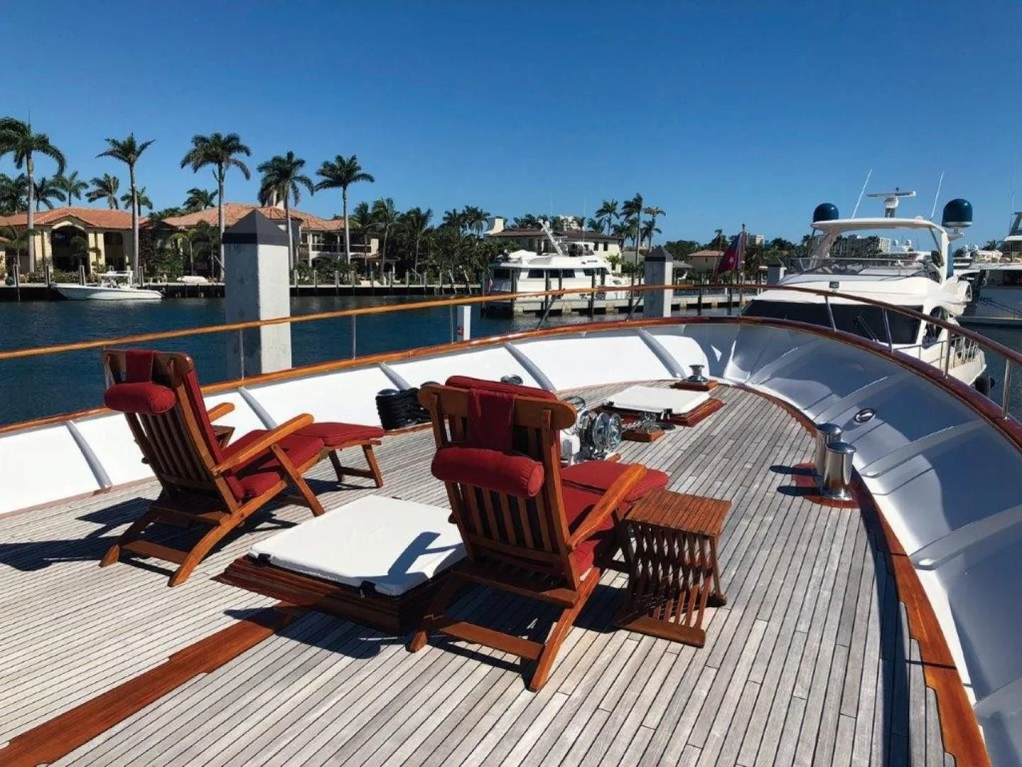 a deck with chairs and a pool aboard SEA CZAR Yacht for Sale