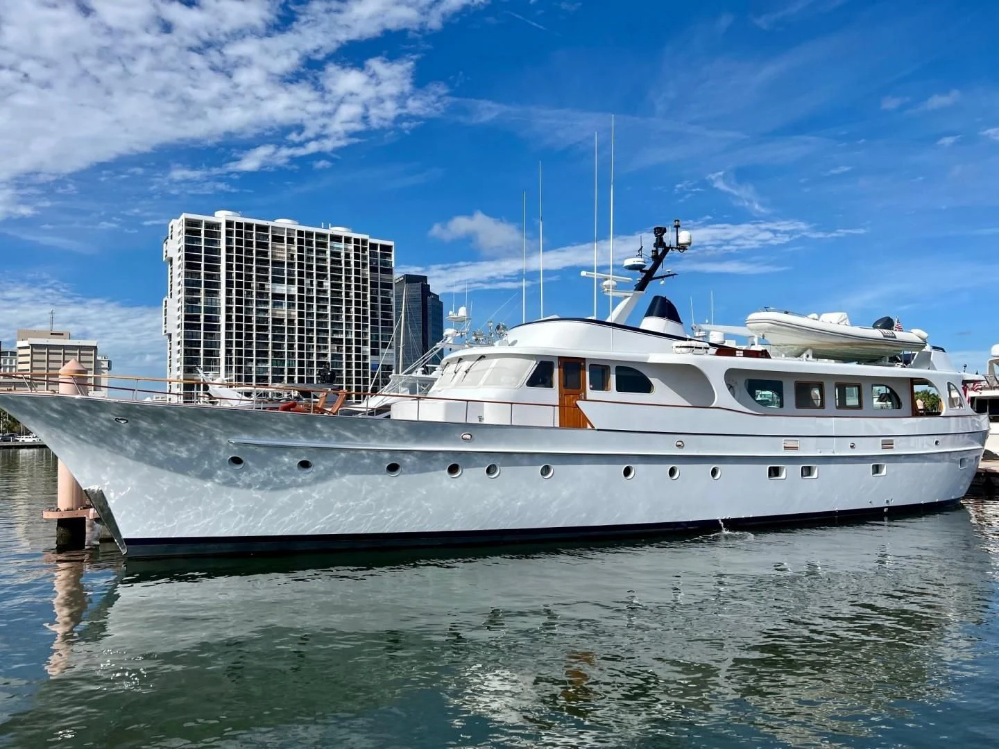 a white yacht in the water aboard SEA CZAR Yacht for Sale