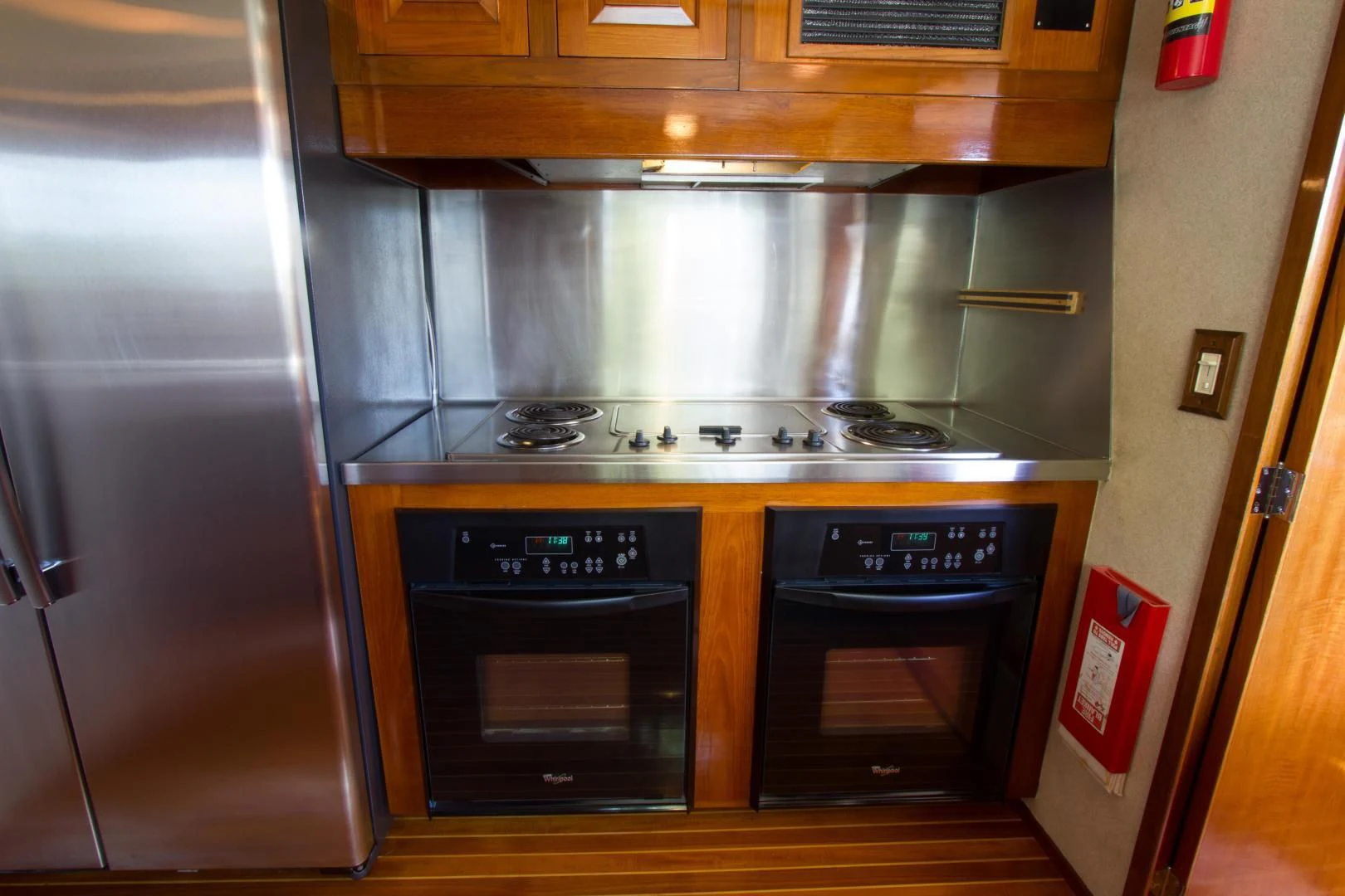 a kitchen with stainless steel appliances aboard SEA CZAR Yacht for Sale