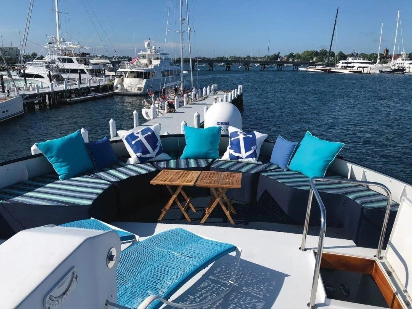 a boat with blue chairs on it aboard SEA CZAR Yacht for Sale