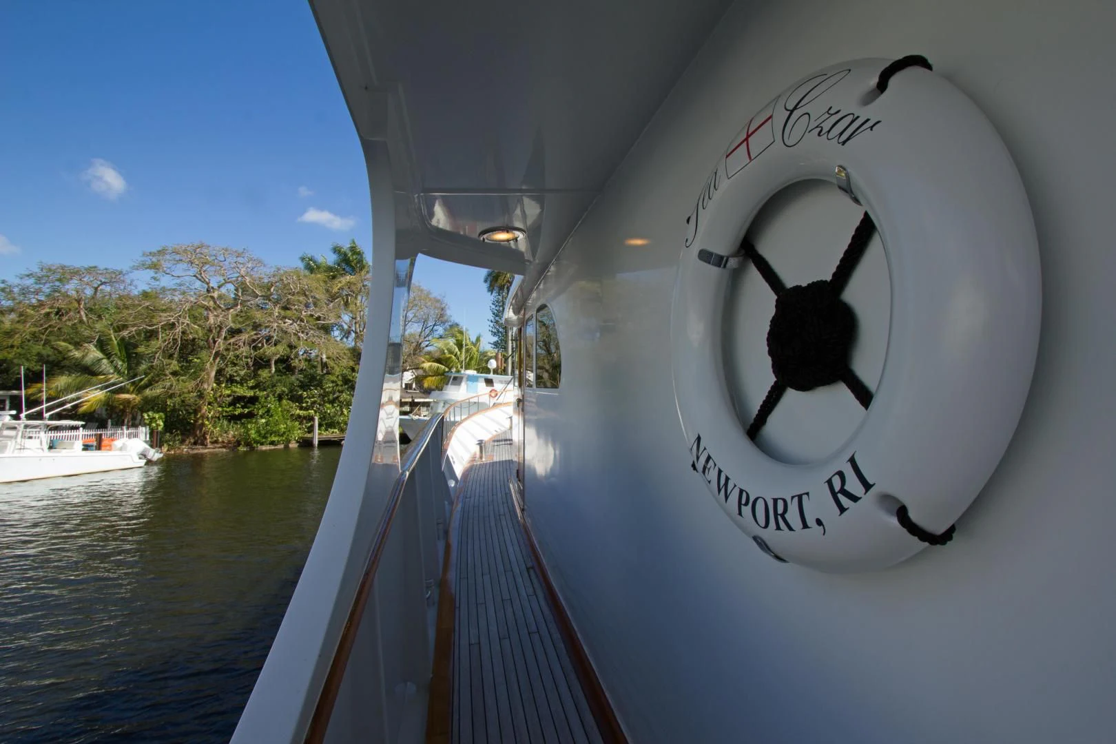 a boat with a clock on it aboard SEA CZAR Yacht for Sale