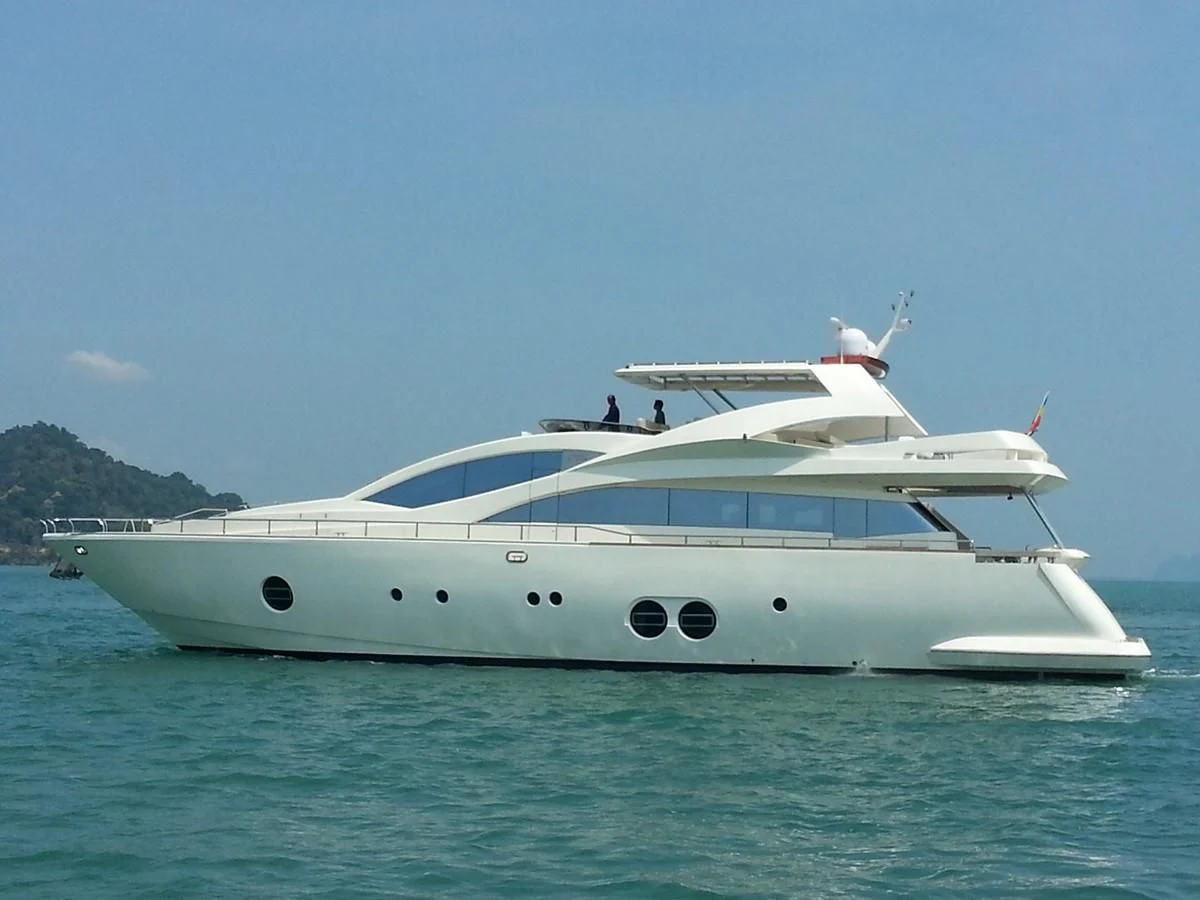 a white yacht in the water aboard MY JAYA Yacht for Sale