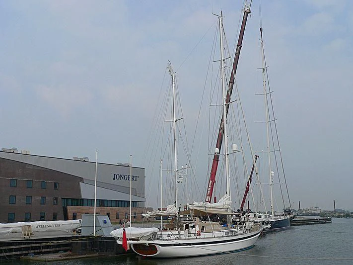 a group of boats are parked in a harbor aboard IMPRESSION Yacht for Sale