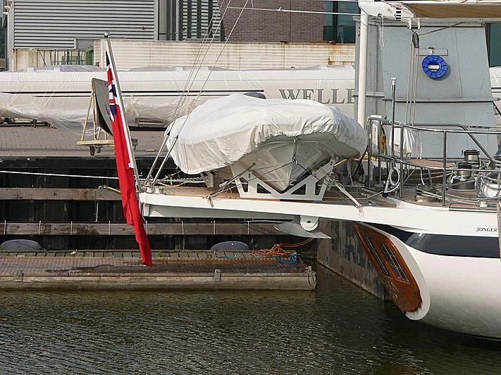 a boat docked at a pier aboard IMPRESSION Yacht for Sale