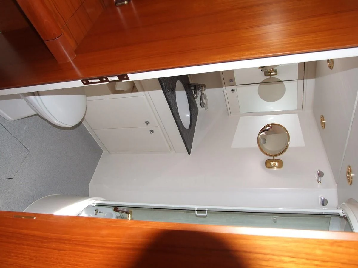 a white rectangular object with a round light on it aboard IMPRESSION Yacht for Sale