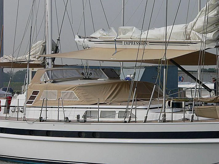 a large white boat aboard IMPRESSION Yacht for Sale