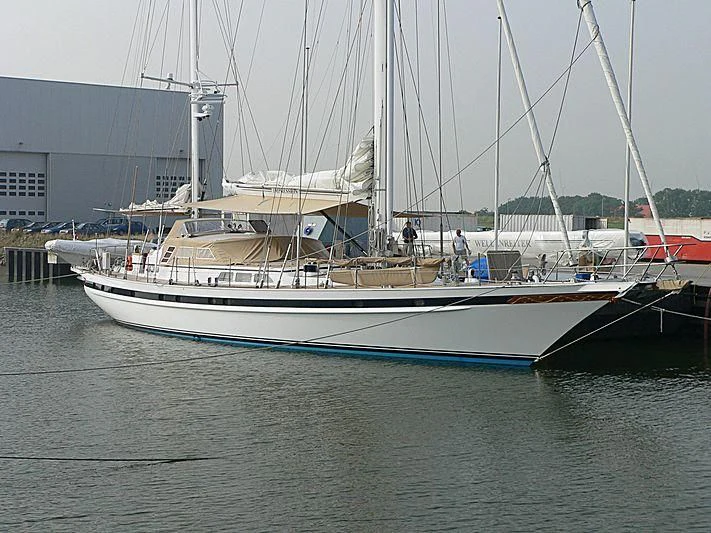 a boat docked at a pier aboard IMPRESSION Yacht for Sale