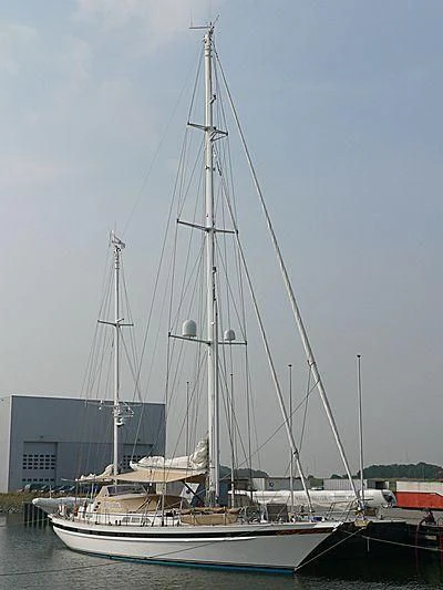 a boat docked at a pier aboard IMPRESSION Yacht for Sale