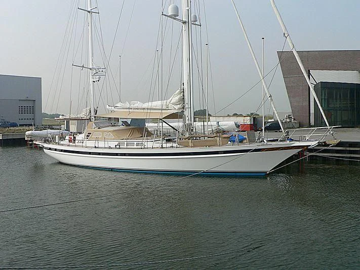 a boat docked at a pier aboard IMPRESSION Yacht for Sale