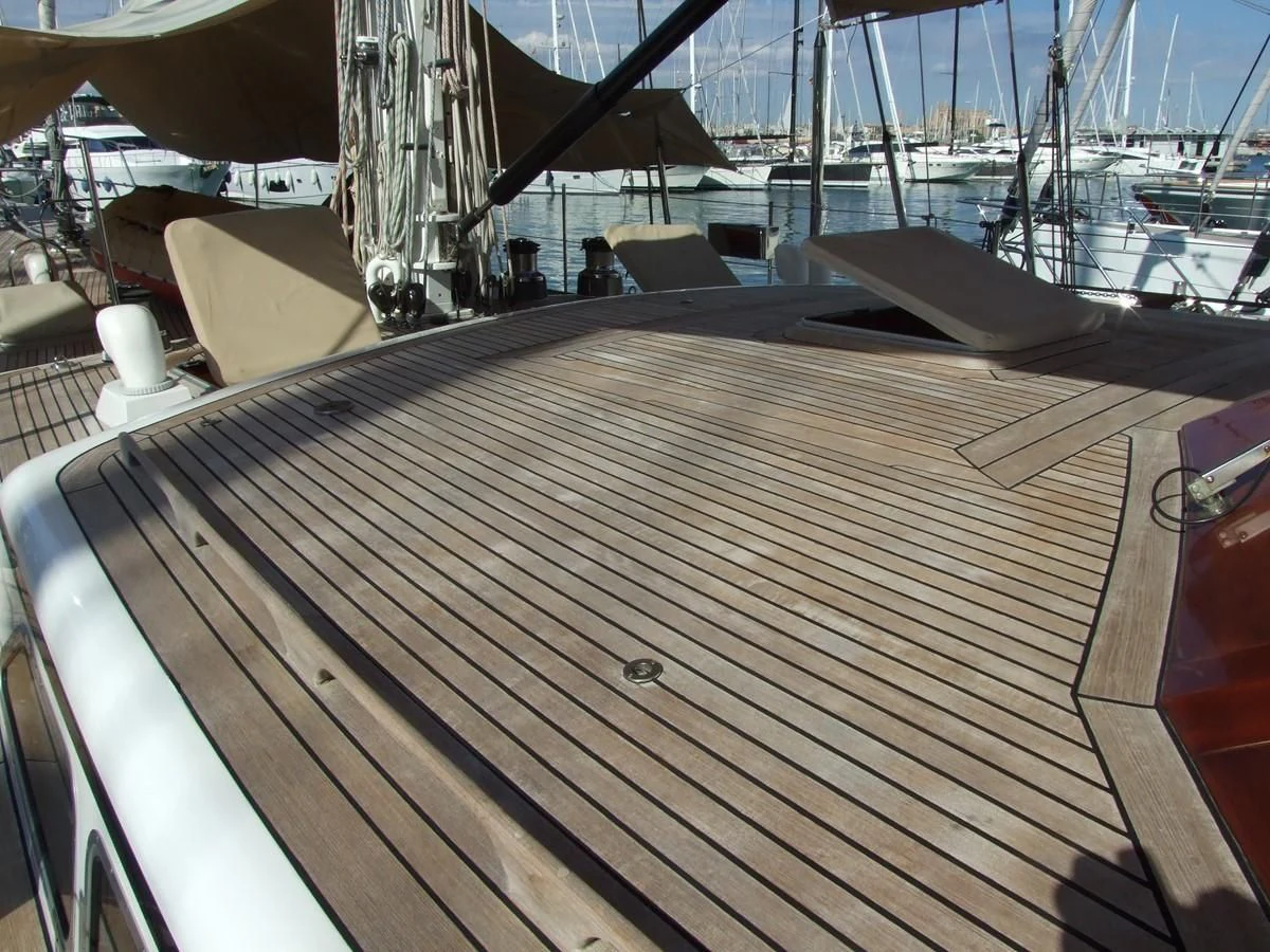 a wooden deck on a boat aboard IMPRESSION Yacht for Sale