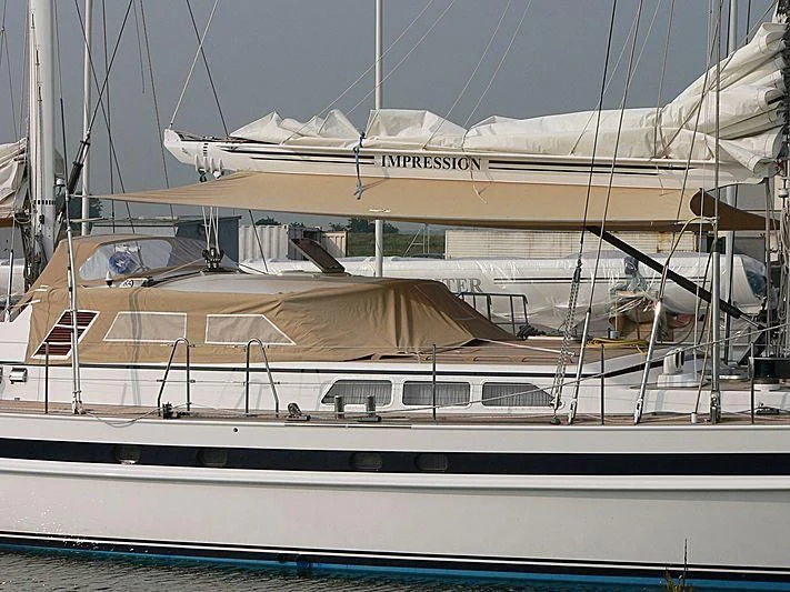 a large white boat aboard IMPRESSION Yacht for Sale
