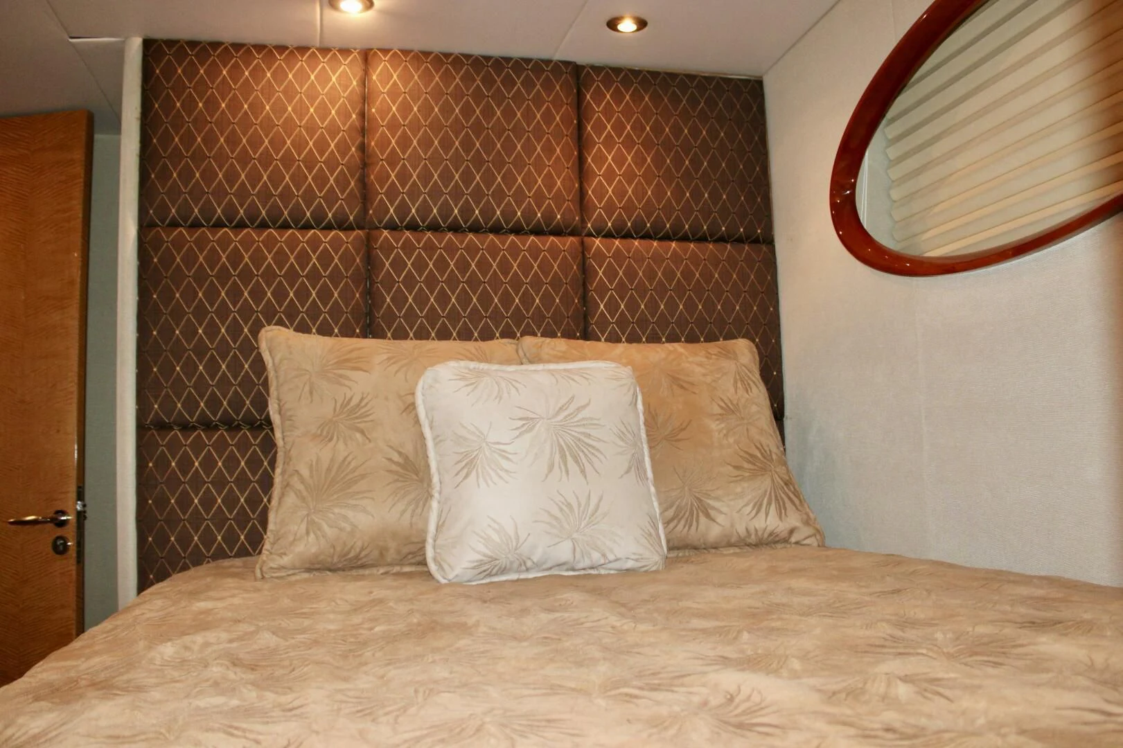 a bed with pillows aboard KATHLEEN Yacht for Sale