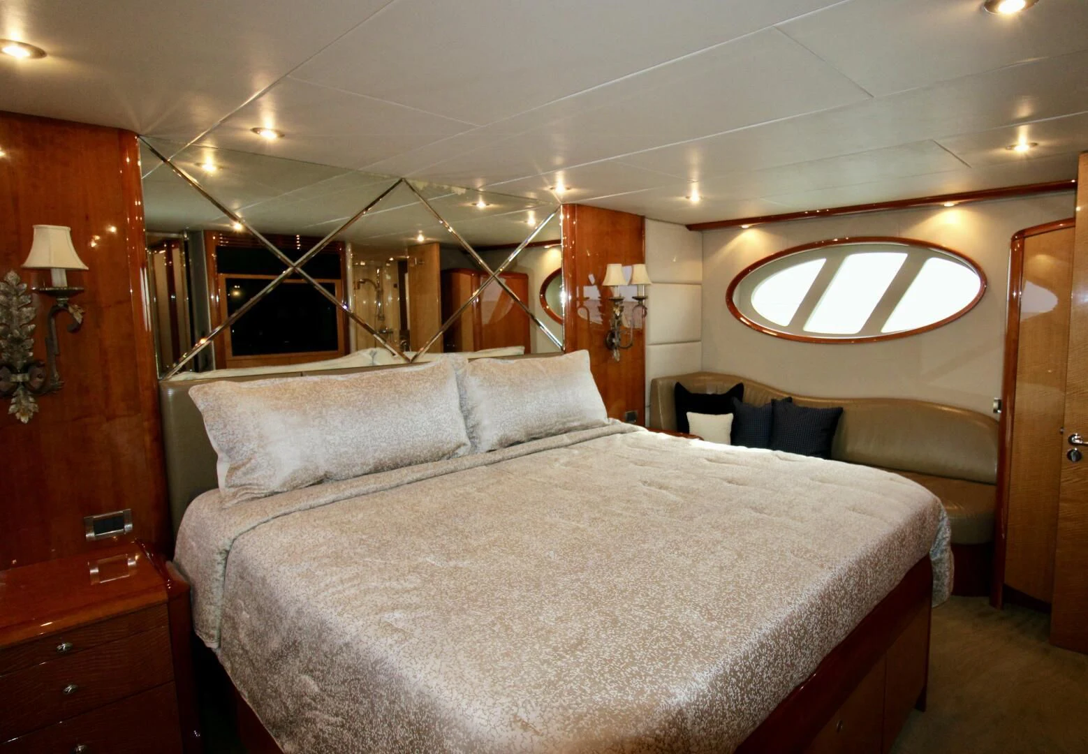 a bed with a white comforter aboard KATHLEEN Yacht for Sale