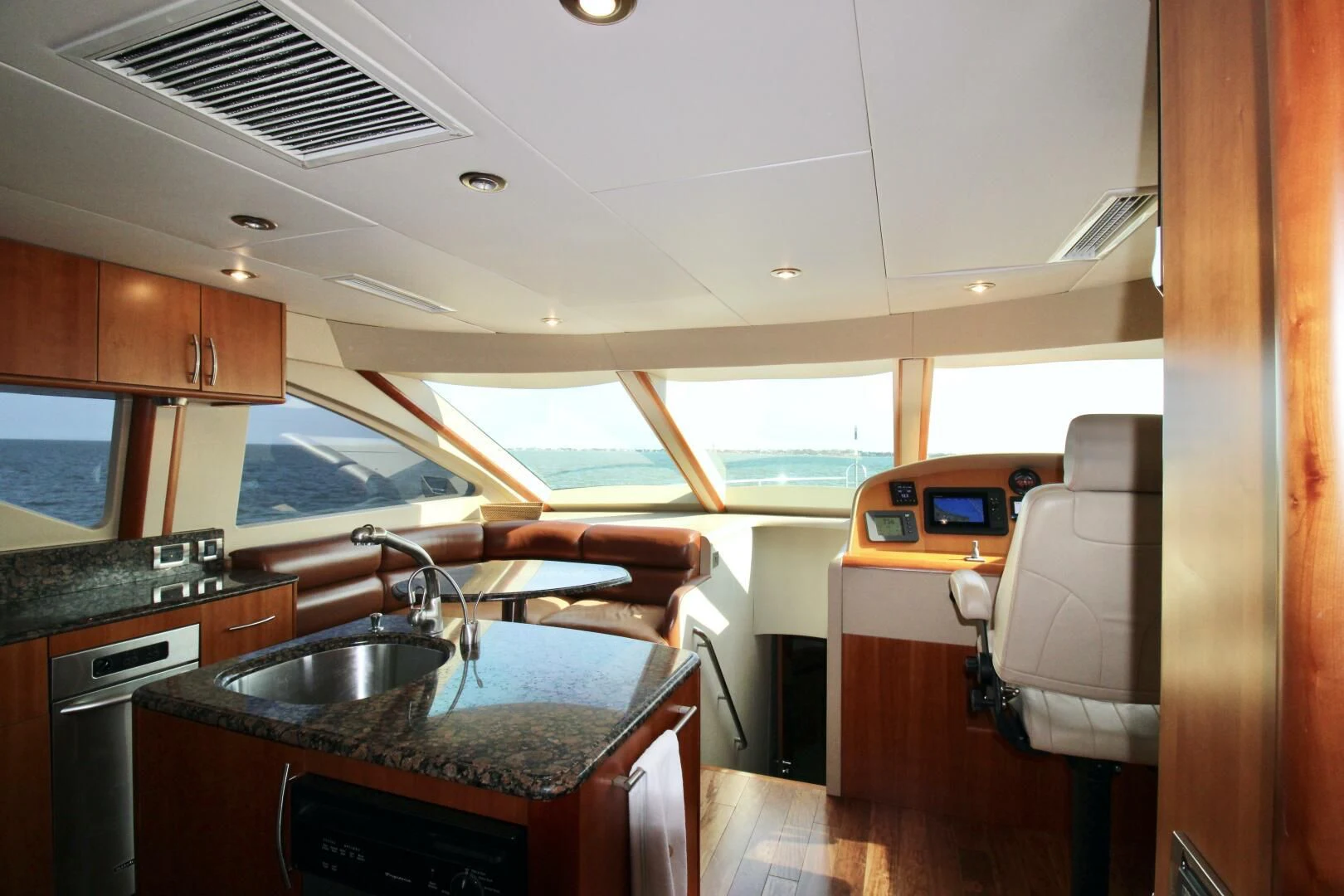 a kitchen with a sink and a microwave aboard KATHLEEN Yacht for Sale