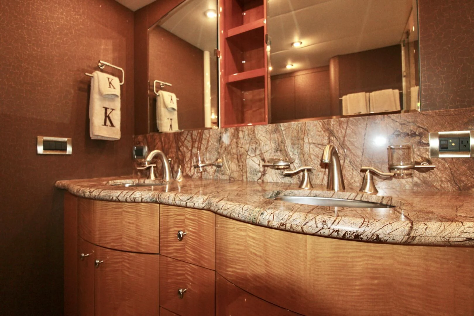 a bathroom with a large mirror aboard KATHLEEN Yacht for Sale