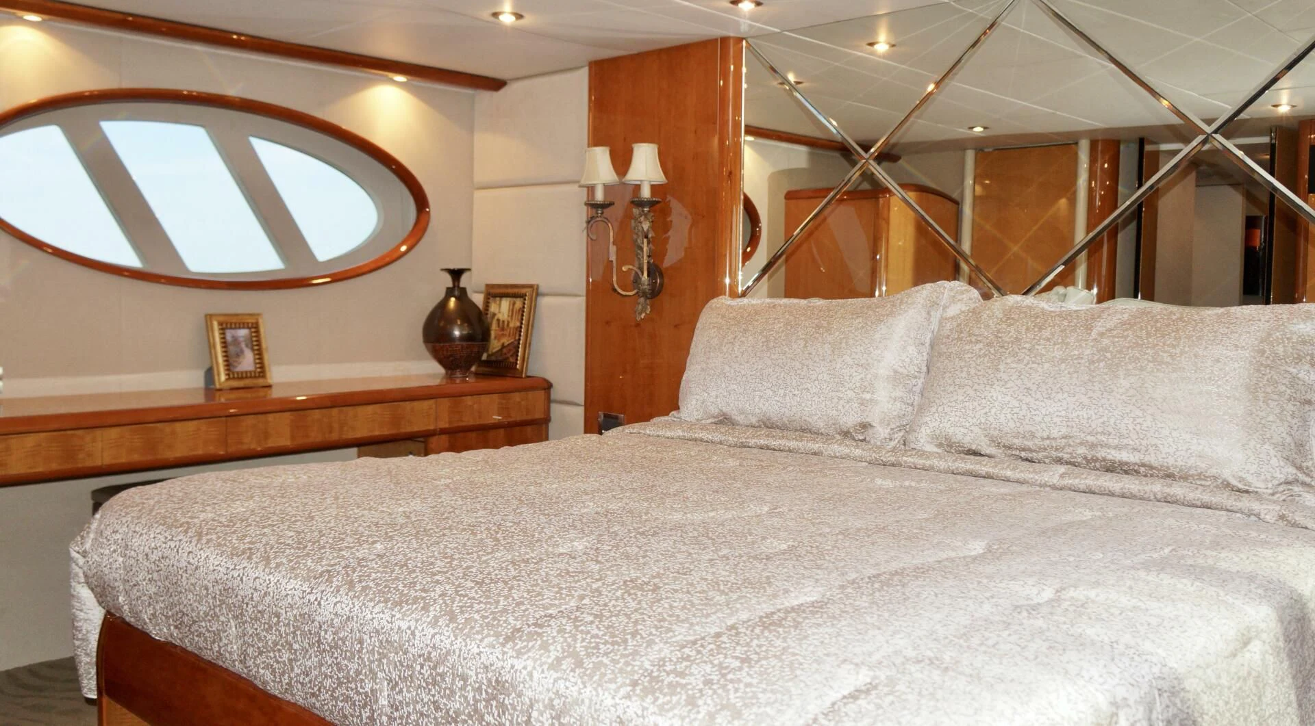 a bed with a white comforter aboard KATHLEEN Yacht for Sale