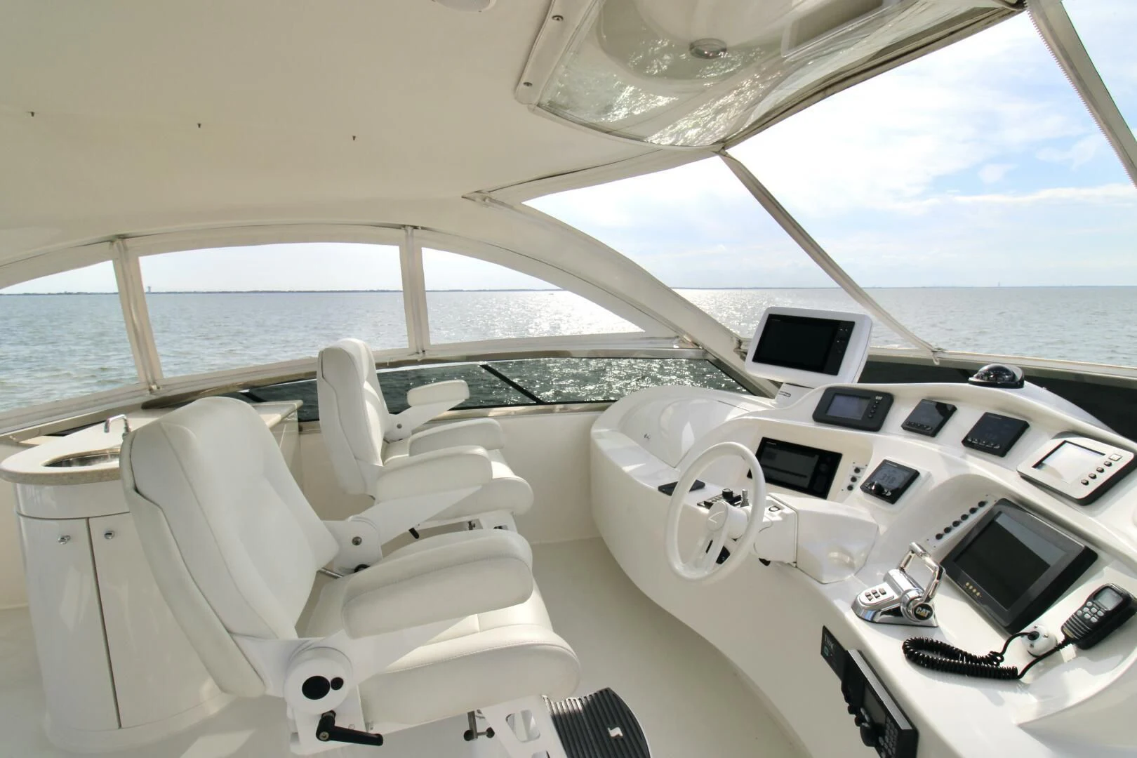a white car with a large windshield aboard KATHLEEN Yacht for Sale