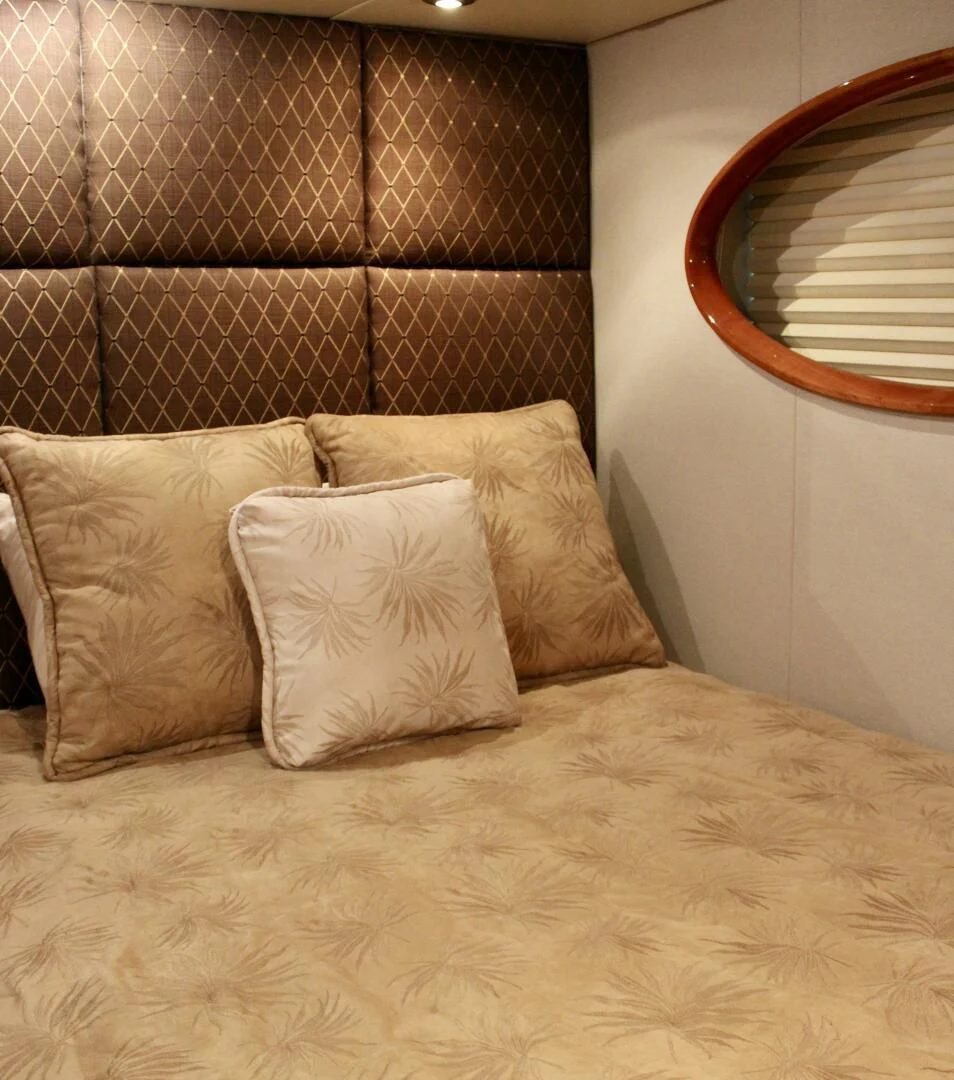 a bed with pillows aboard KATHLEEN Yacht for Sale