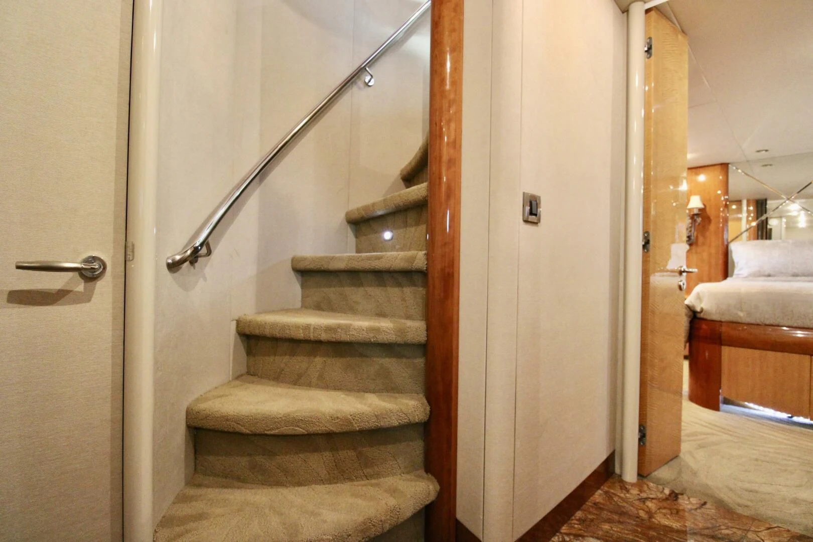 a staircase with a metal railing aboard KATHLEEN Yacht for Sale