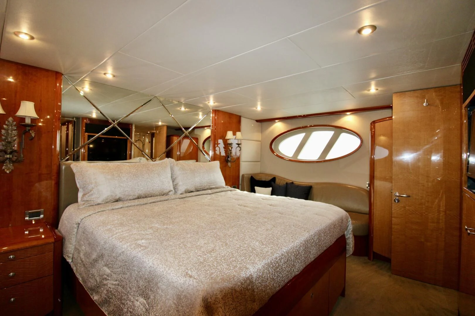 a bedroom with a bed and a closet aboard KATHLEEN Yacht for Sale