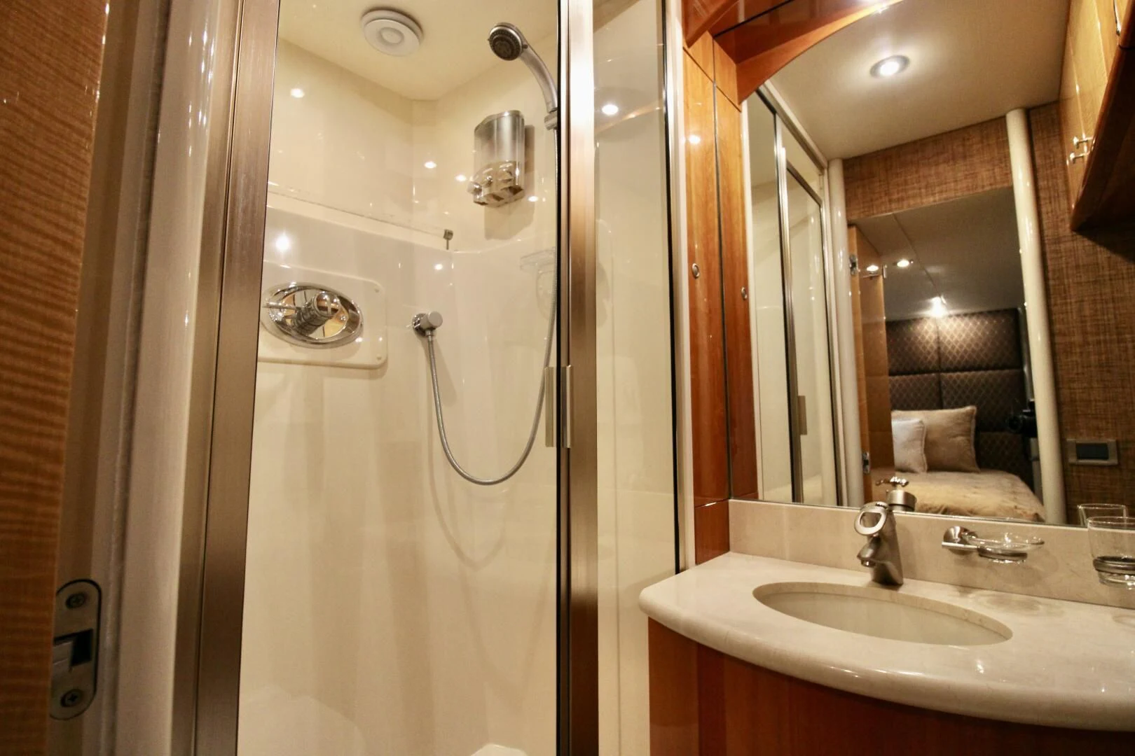 a bathroom with a glass shower aboard KATHLEEN Yacht for Sale