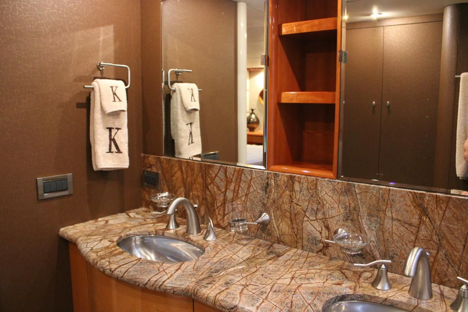 a bathroom with a large mirror aboard KATHLEEN Yacht for Sale