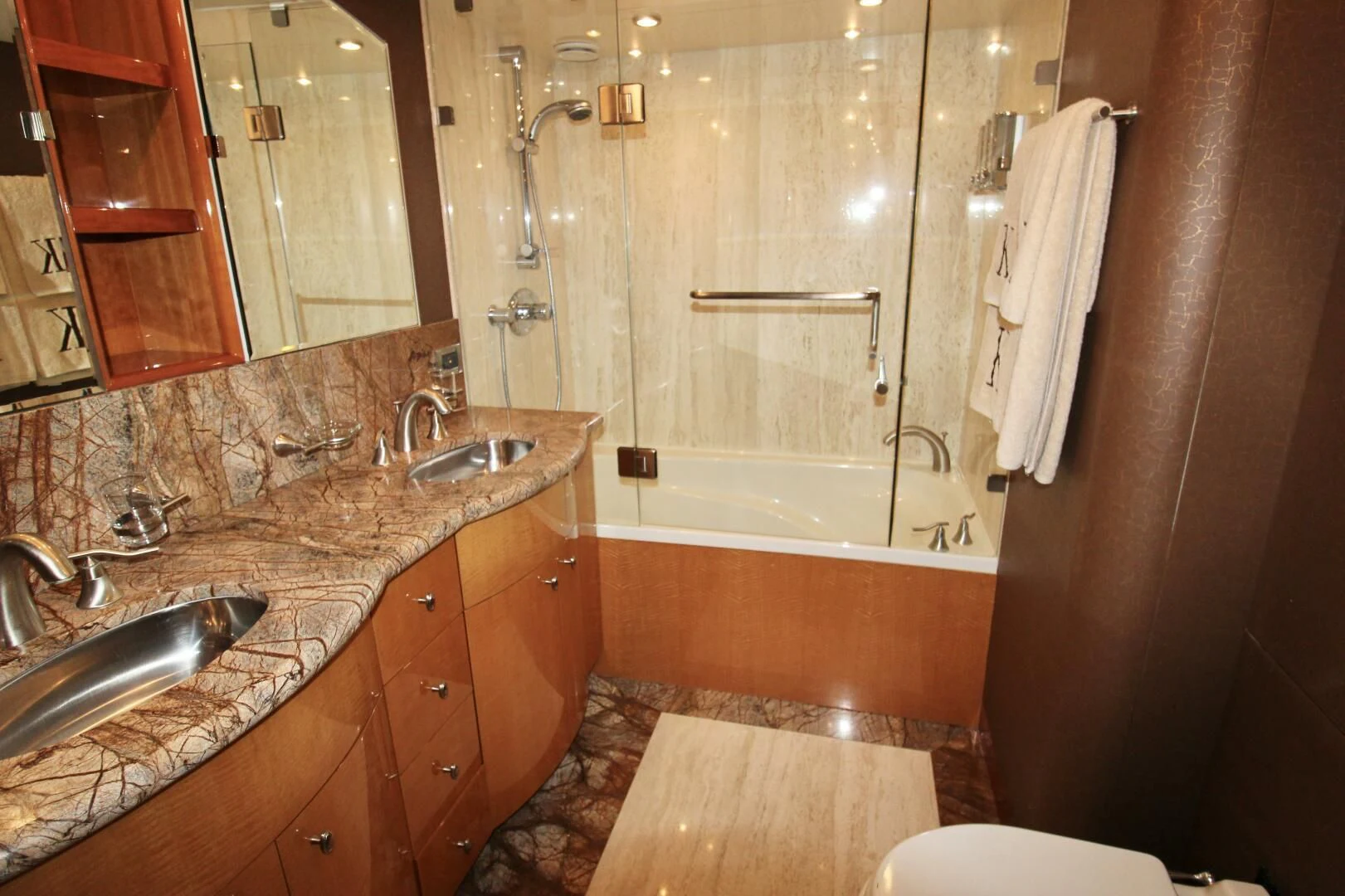 a bathroom with marble counter tops aboard KATHLEEN Yacht for Sale