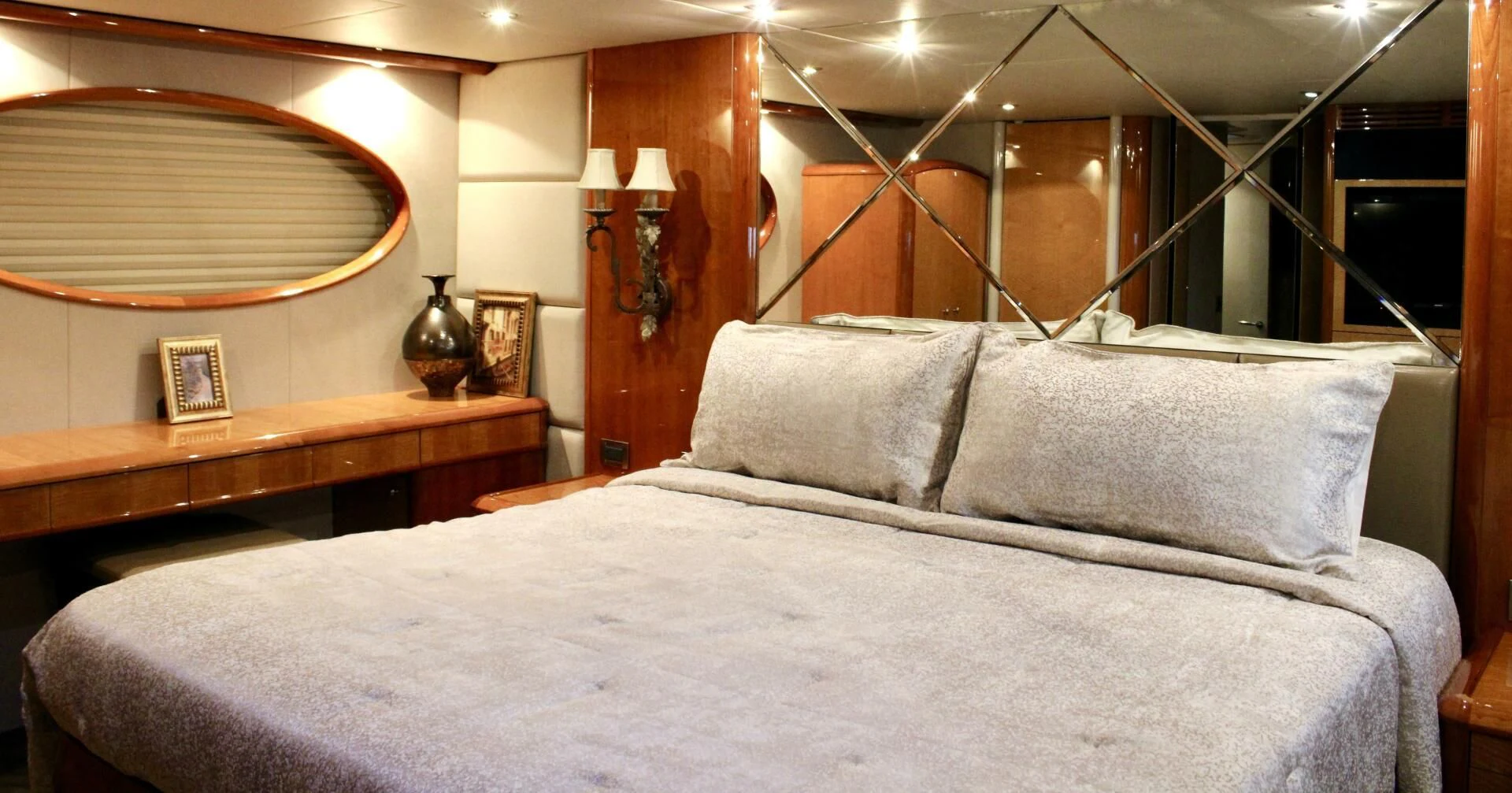 a bed with a white comforter aboard KATHLEEN Yacht for Sale