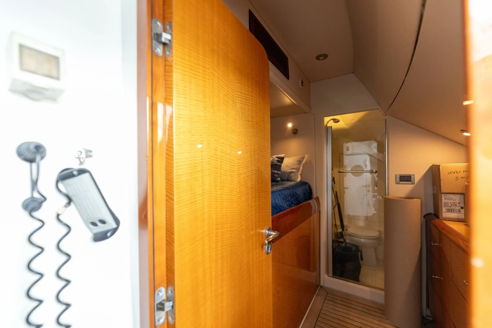 a room with a bed and a desk aboard KATHLEEN Yacht for Sale