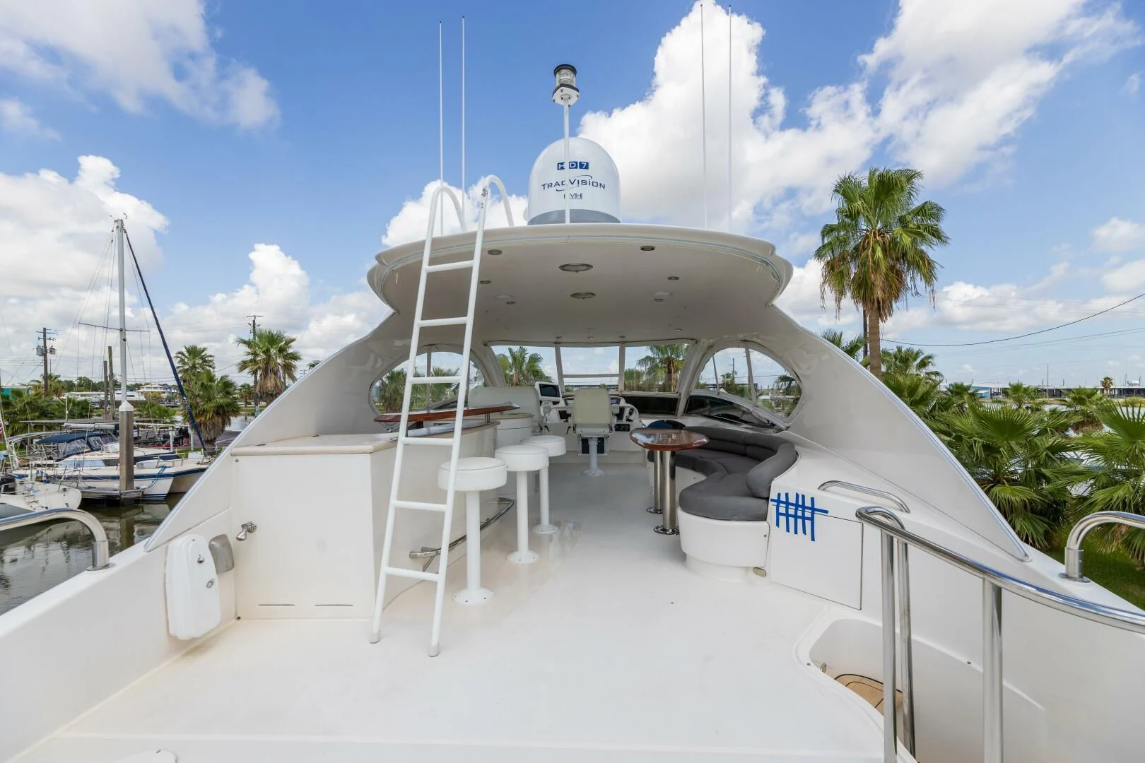 a white boat with a satellite dish on it aboard KATHLEEN Yacht for Sale