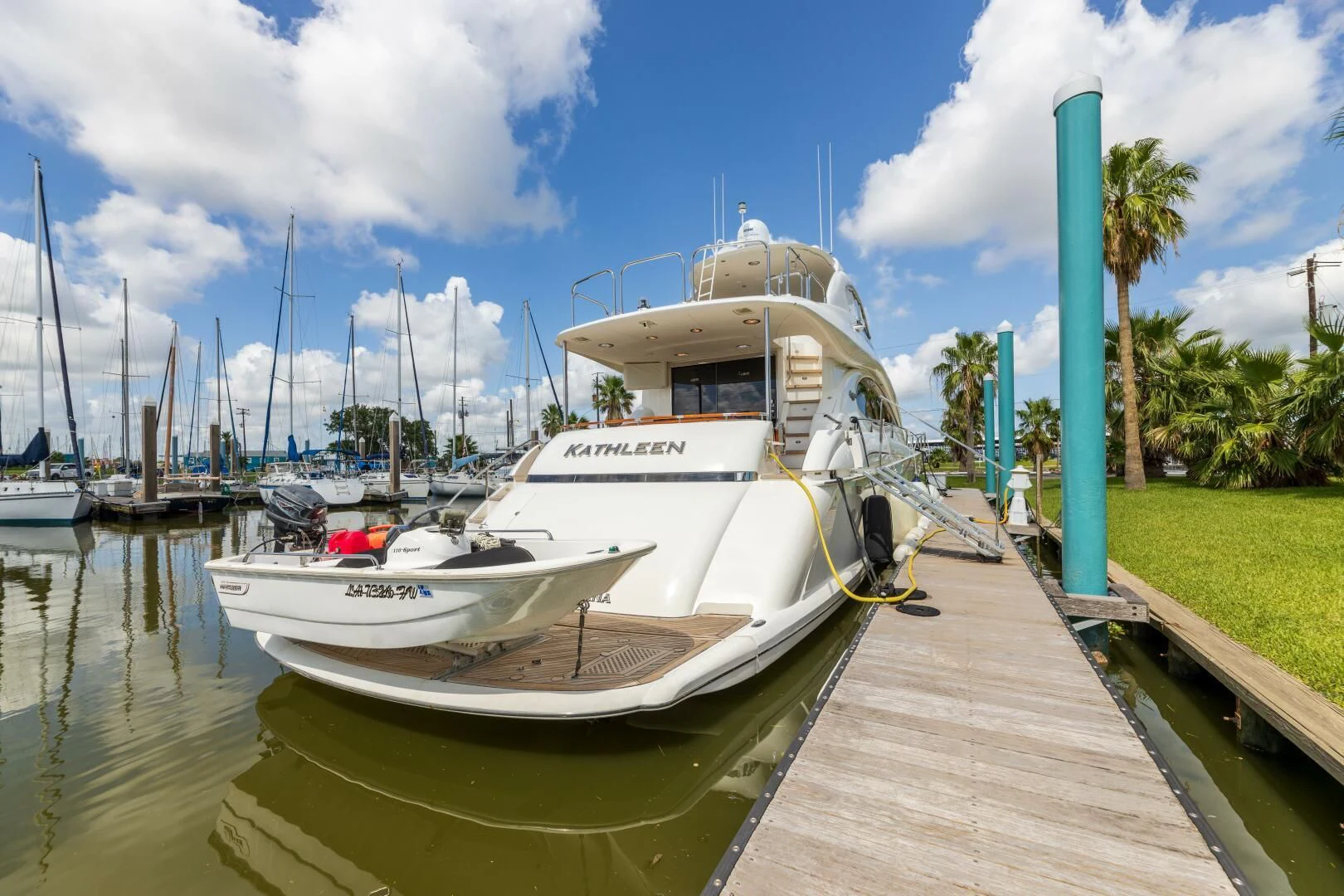 a boat docked at a dock aboard KATHLEEN Yacht for Sale