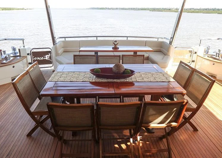 a dining table on a boat aboard BISCARI Yacht for Sale