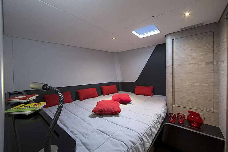 a bed in a room aboard V Yacht for Sale