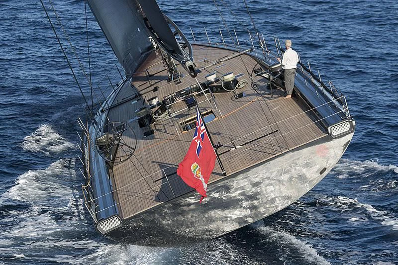 a person standing on a boat aboard V Yacht for Sale
