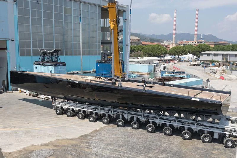 a large black truck with a crane on top of it aboard V Yacht for Sale
