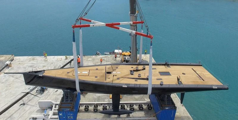 a large ship docked aboard V Yacht for Sale