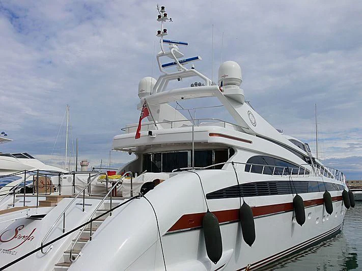 a white yacht docked aboard SAMJA Yacht for Sale