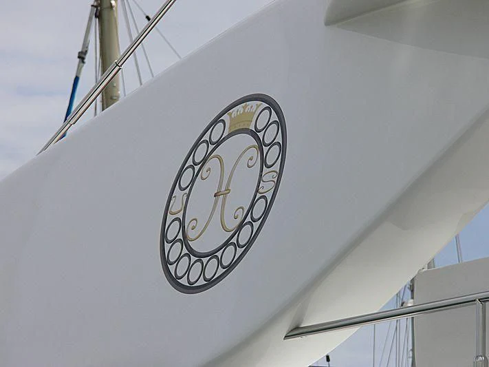 a clock on a building aboard SAMJA Yacht for Sale