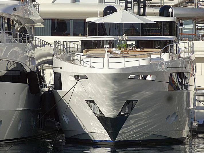 a boat in a large room aboard CAROBELLE Yacht for Sale