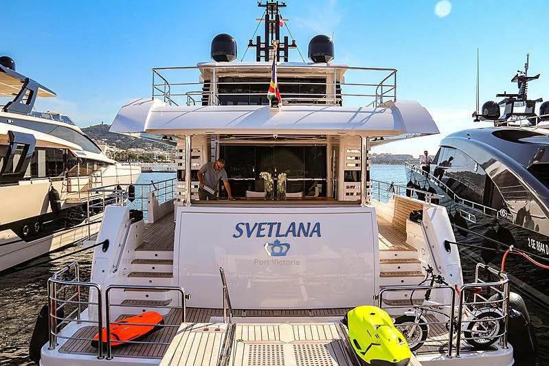 a boat docked at a pier aboard CAROBELLE Yacht for Sale
