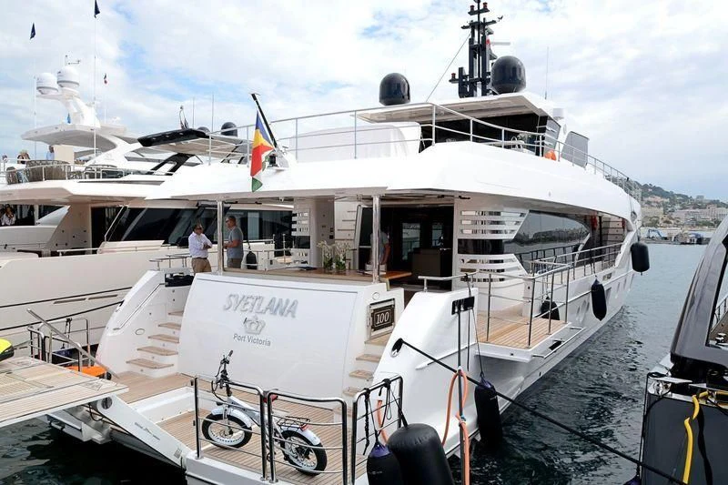 a boat docked at a pier aboard CAROBELLE Yacht for Sale