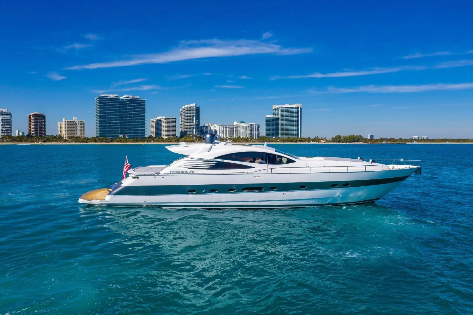 a white yacht in the water aboard FREE SPIRIT Yacht for Sale