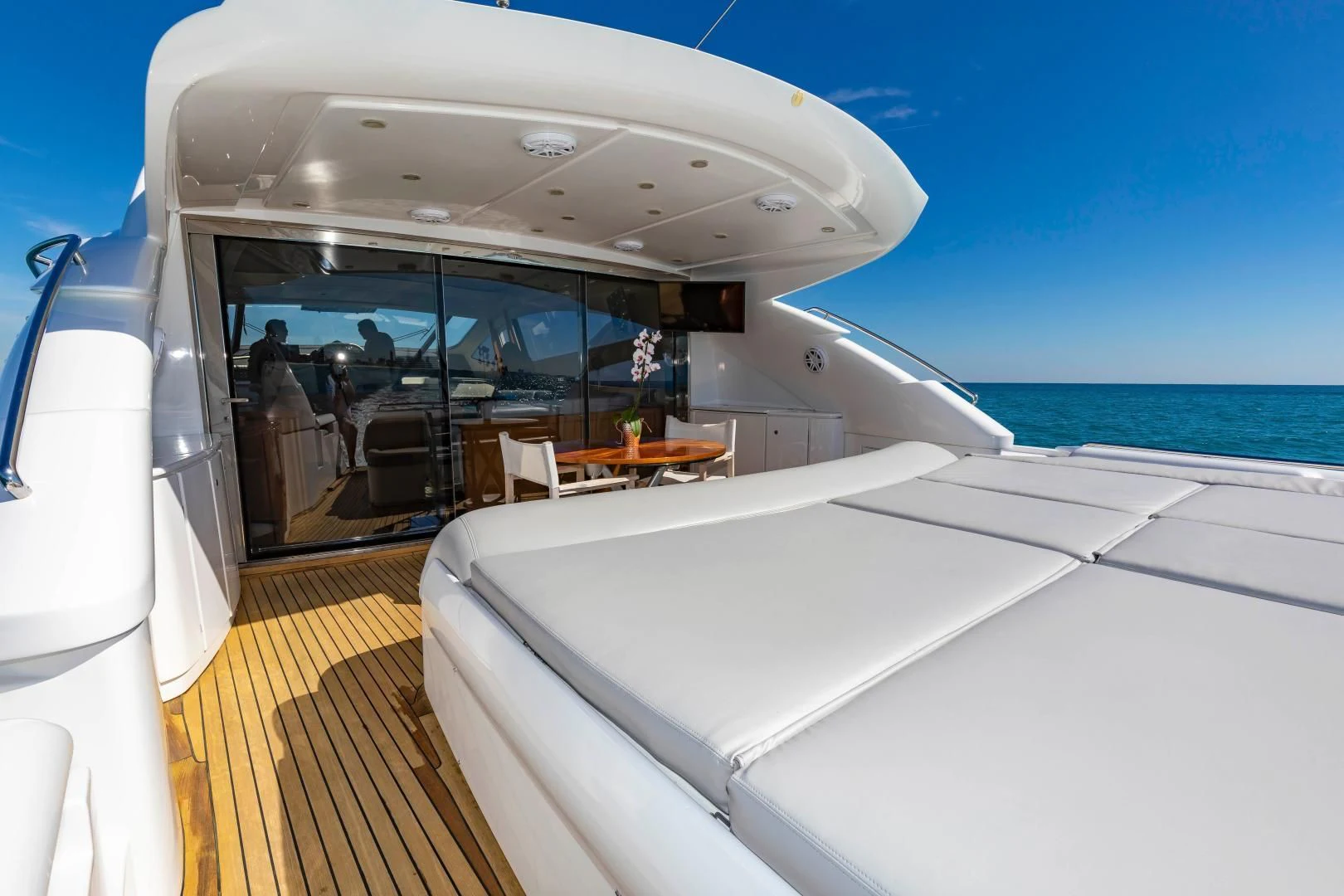 a boat with a white bed and white mattress on the deck aboard FREE SPIRIT Yacht for Sale