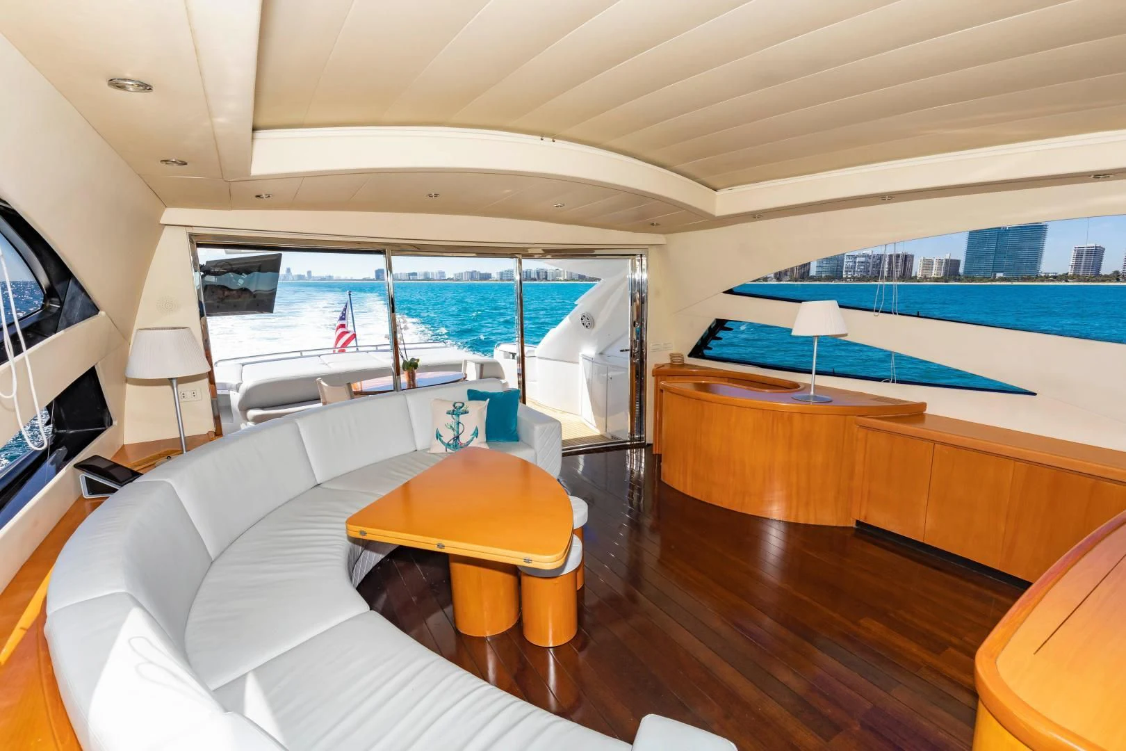 a room with a bed and a large window aboard FREE SPIRIT Yacht for Sale