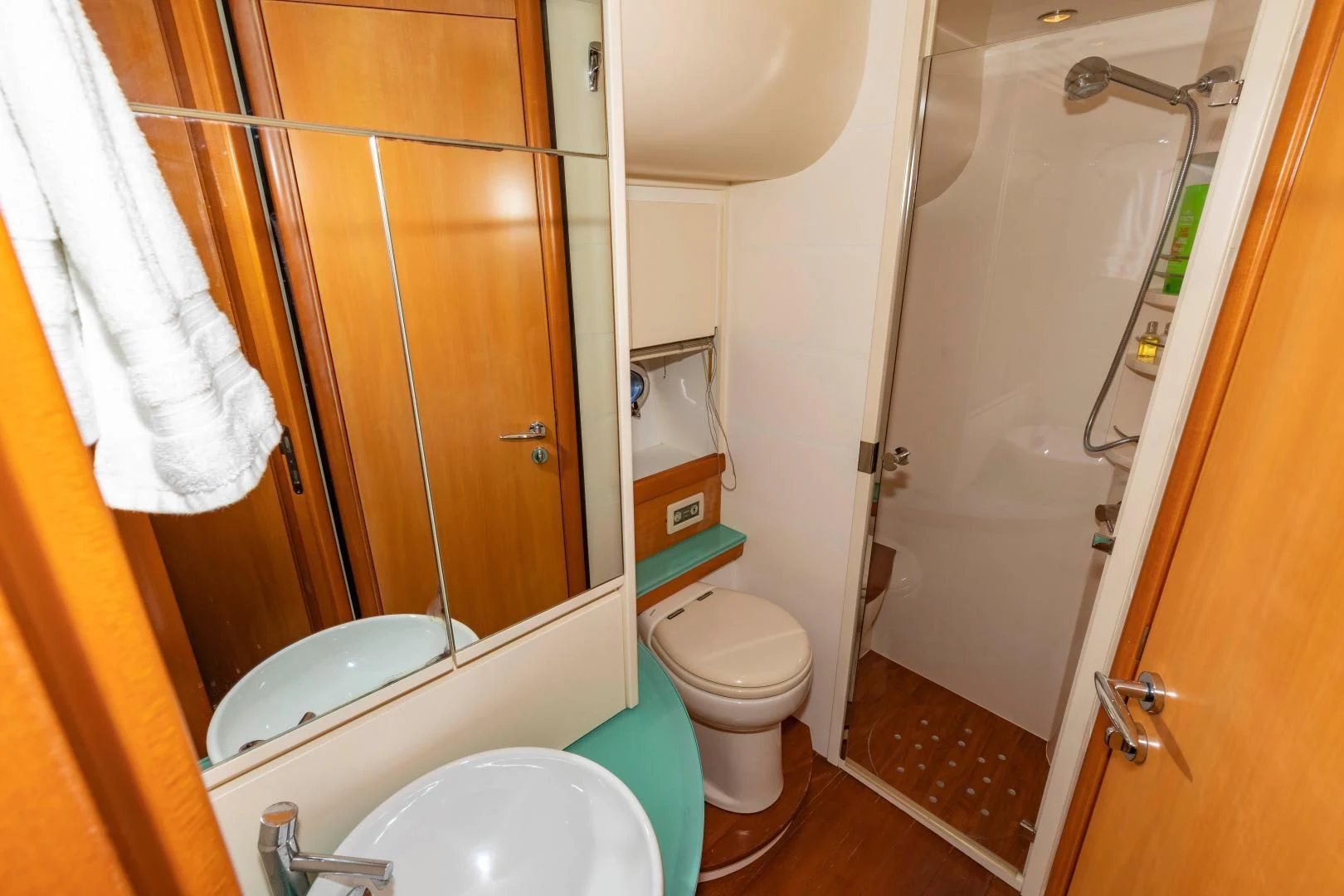 a bathroom with a shower and toilet aboard FREE SPIRIT Yacht for Sale