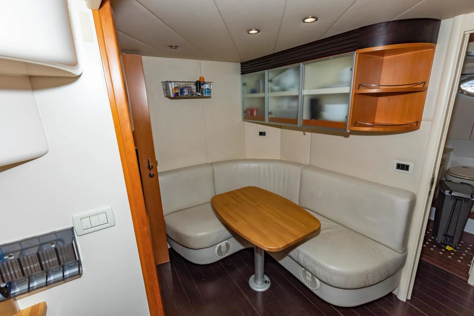 a room with a couch and a table aboard FREE SPIRIT Yacht for Sale