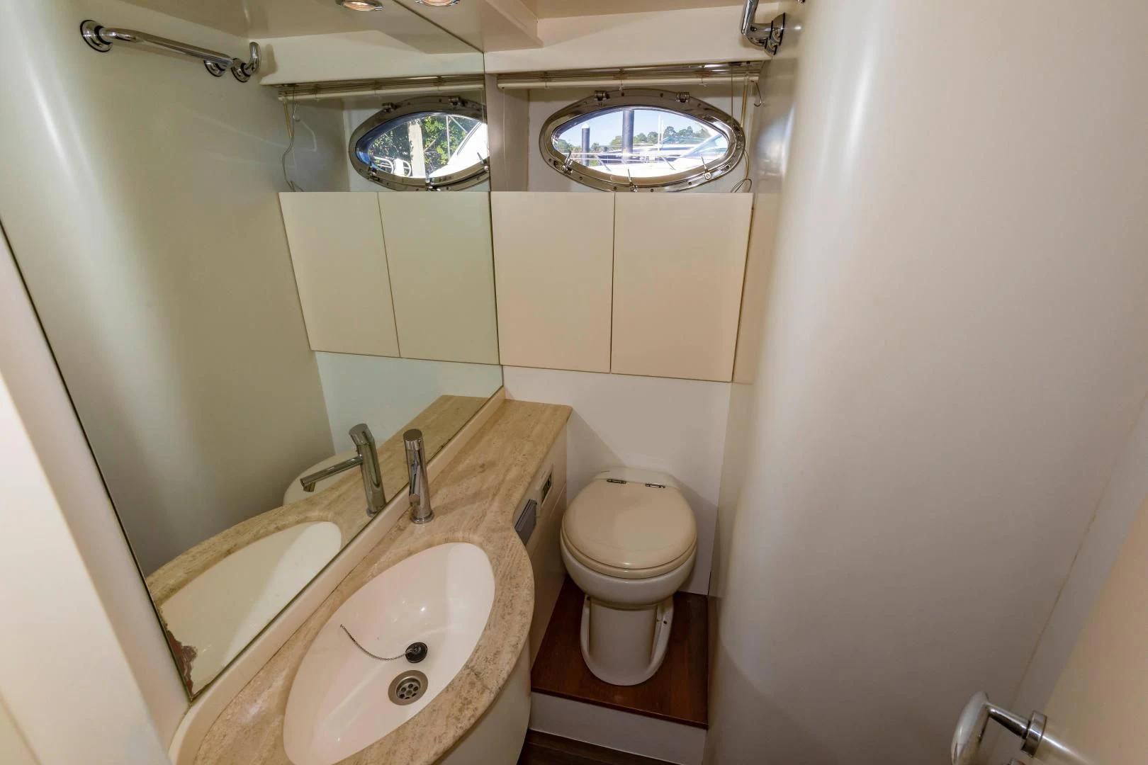 a bathroom with a sink and a toilet aboard FREE SPIRIT Yacht for Sale
